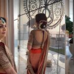 Nita Ambani orange purple silk saree Banarasi handcrafted look