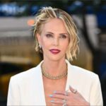 Charlize Theron with daughters Jackson and August at The Odyssey premiere
