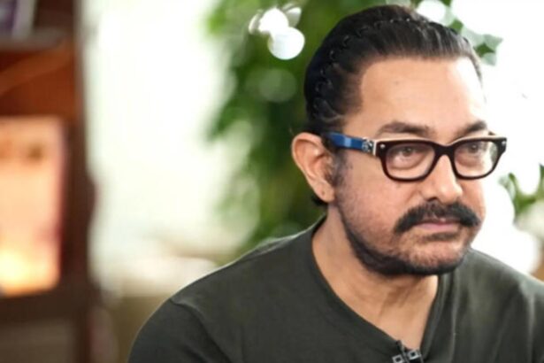 Bollywood actor Aamir Khan during a public event amid reports of a threat message.
