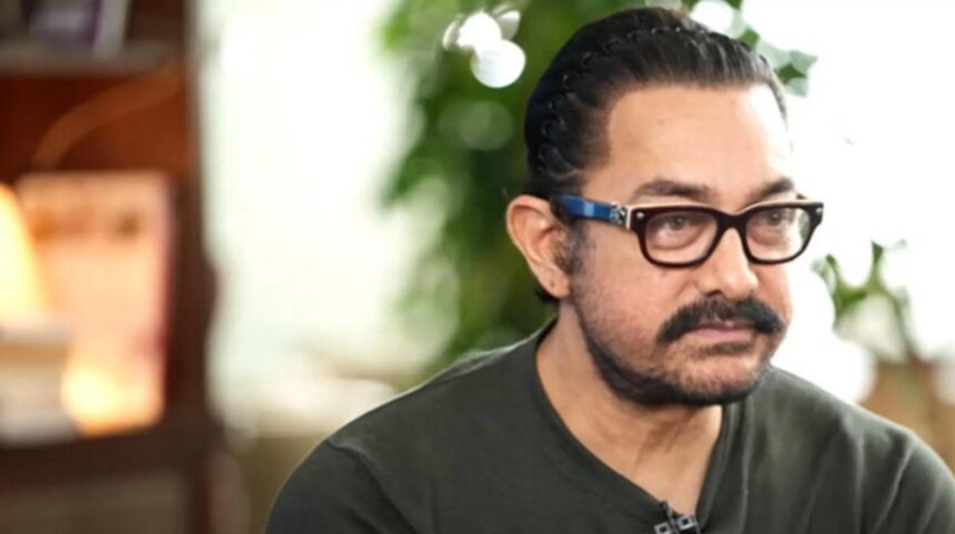 Bollywood actor Aamir Khan during a public event amid reports of a threat message.