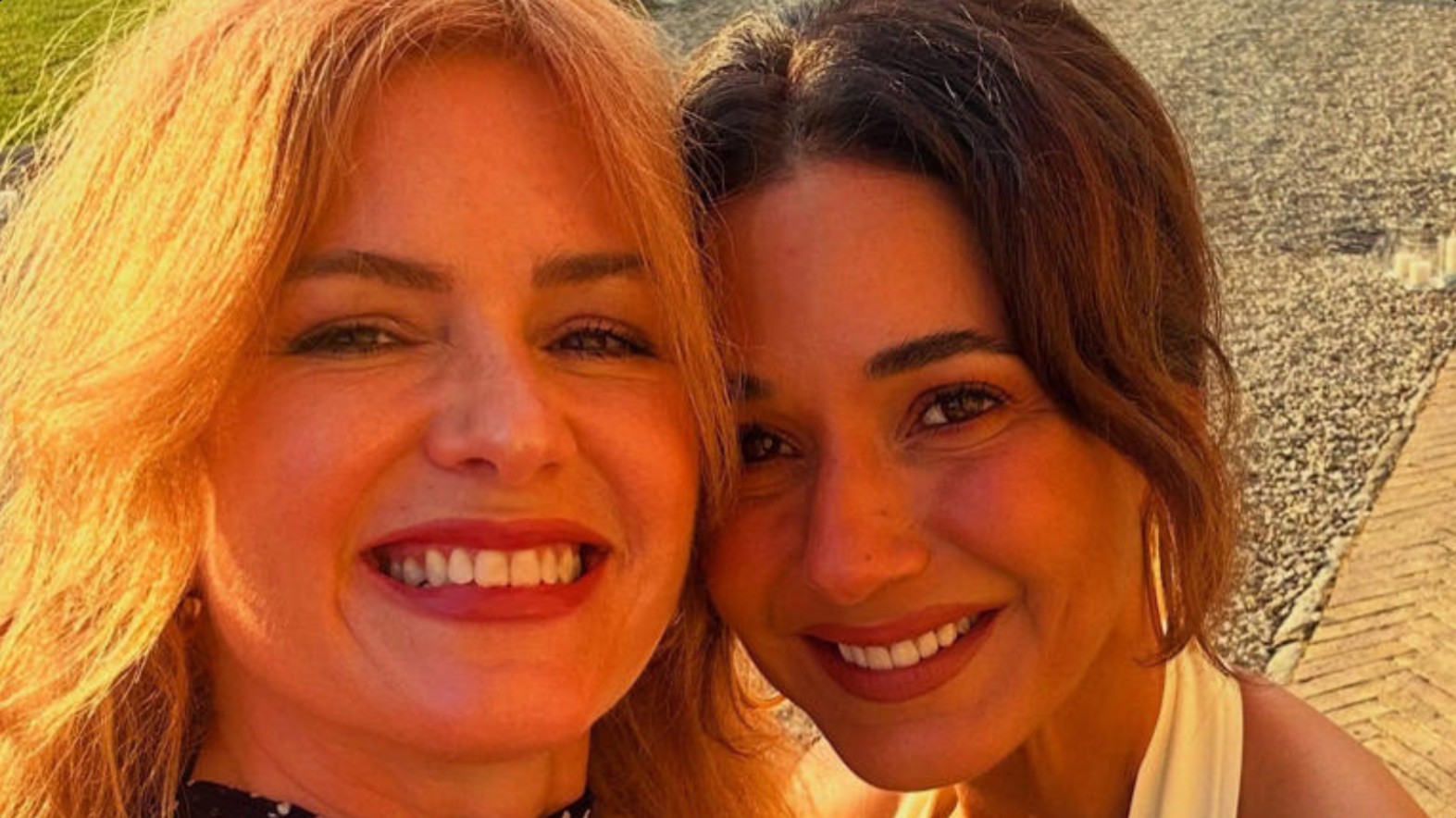 Isla Fisher and Emmanuelle Chriqui at a luxury wedding celebration in Tuscany Italy