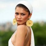 Zendaya wearing ancient Iranian gold disc earrings at The Odyssey event in London
