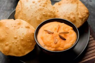 Assorted regional Indian pooris including Bedmi Puri, Luchi, Palak Puri, Masala Puri, and Mangalore Buns served with traditional accompaniments.