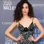 Emmy Rossum discussing her marriage and divorce from Justin Siegel during a podcast interview.